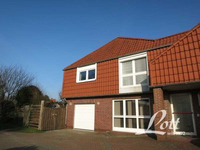 ** Erdgeschosswohnung mit Terrasse und Gartennutzung **