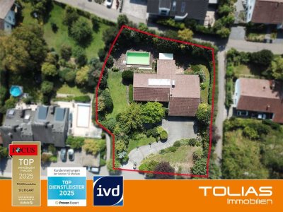Traumhaftes Grundstück in A-Lage! Frei stehendes Architektenhaus mit Pool - großer Anbau genehmigt