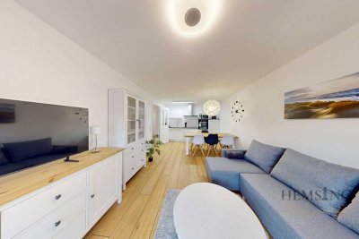 Stilvoll & effizient: Möblierte Neubauwohnung mit Terrasse, PV-Anlage & Ankleide