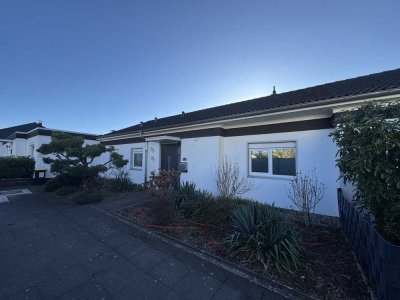 Ebenerdiges Bungalow-Reiheneinfamilienhaus in Hannover-Groß-Buchholz mit effizienten Grundofen