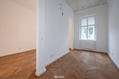 Sanierter Altbau mit modernem Neubau