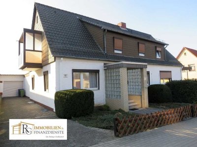Sehr gepflegte DHH mit einer Einliegerwohnung und geschütztem Gartengrundstück