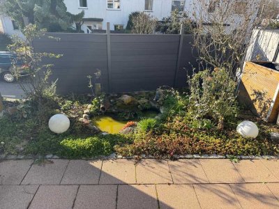 Reihenmittelhaus mit Garage und kleinem Garten