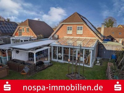Einfamilienhaus in Schleswig - Ebenerdig bewohnbar mit Wintergarten 
und Photovoltaikanlage