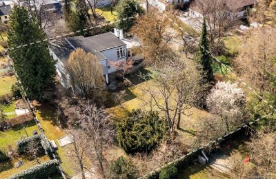 Familientraum in Bestlage Obermenzing: Parkähnliches, weitläufiges Grundstück mit Architekten-Haus.
