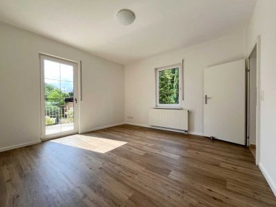Geräumige Wohnung über 2 Etagen mit großem Garten