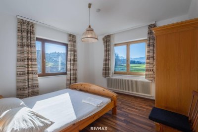 Kärntner Wohncharme in Seenähe – 5-Zimmer-Wohnung mit Kachelofen &amp; Balkon