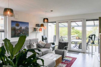 Strandnahe Ruheoase: Hochwertige Wohnung mit Garten und überdachter Terrasse in Scharbeutz