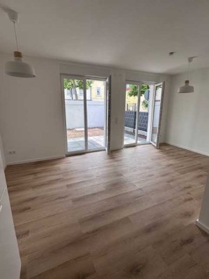 2 Zimmer Neubauwohnung mit kleinen Garten, Erstbezug 2026