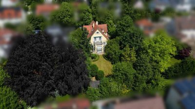 Absolute Rarität! Charmantes Einfamilienhaus mit wunderschön eingewachsenem Garten in Premiumlage!