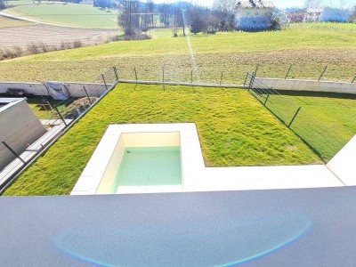 ERSTBEZUG! Exklusive Haushälfte mit Klima, Garage, Garten u. Pool