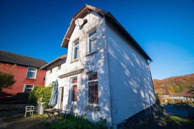 ZFH in Bad Schwartau – großes Hanggrundstück, sanierungsbedürftiger Altbau mit viel Potenzial