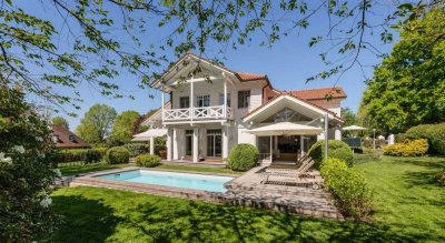 ENGEL & VÖLKERS: Am See zuhause - Stilvolle Villa mit Privatsphäre, Pool und Premium-Ausstattung