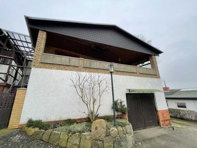 Einfamilienhaus mit Balkon, Einliegerwohnung, großer Garage und Kamin