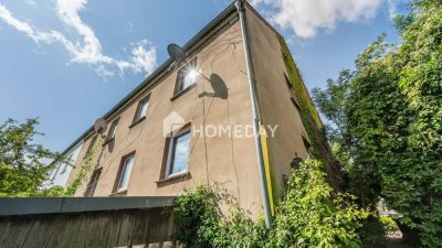 Charmantes Zweifamilienhaus in ruhiger Lage mit großem Garten und vielseitigem Raumangebot