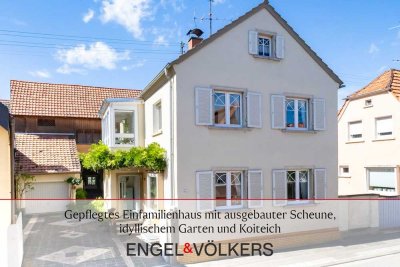Gepflegtes Einfamilienhaus mit ausgebauter Scheune, idyllischem Garten und Koiteich
