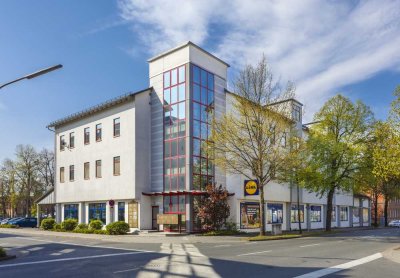 Schöne Wohnung in attraktivem Wohn- und Geschäftshaus