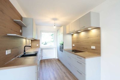 Erstbezug nach Sanierung: Chice 3-Zi-EG-Wohnung mit eigenem Garten + Einbauküche in Puchheim/Bhf.
