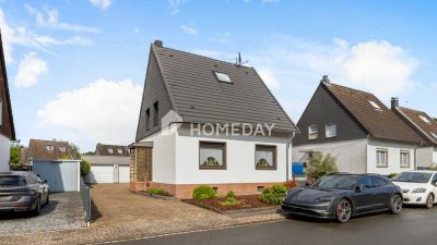 Ideal für Mehrgenerationen: Zweifamilienhaus mit großem Außenbereich und zwei Garagen