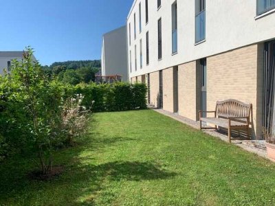 Familienfreundliche 4-Zimmer-Erdgeschosswohnung mit Terrasse und großem Garten