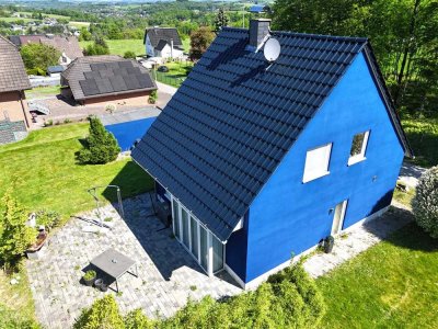 Behagliches Einfamilienhaus mit Garten und Garage in schöner Höhenlage!