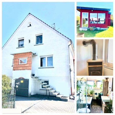 Vielfältiges Zweifamilienhaus auf großzügigem Grundstück mit Partyhaus !