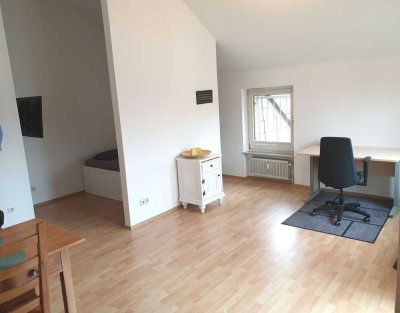Möbliertes 1.5-Zimmer-Apartment + Süd-Balkon + TG-Stellplatz - Befristete Vermietung bis Apr. 2027