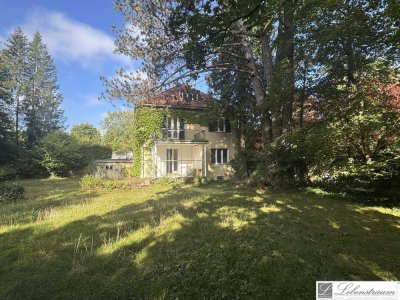 Bebautes Eckgrundstück mit ca. 1.303 m² (sanierungsbedürftigen  Altbestand) in München-Harlaching