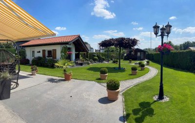 Landhausvilla / Mehrgenerationshaus mit Baugrundstück.