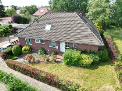 Provisionsfrei! Großzügiger Bungalow mit erneuerter Heizung und idyllischem Garten in Hinte-Haskamp!