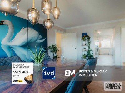 Modernisierte 5-Zimmer-Wohnung mit Grundstück und zwei Garagen