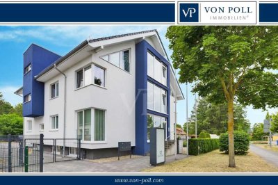 Sonnige und moderne Dachgeschosswohnung mit Pachtgarten und Pkw-Stellplatz
