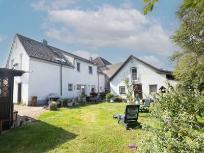 Vielseitige Doppelhaushälfte mit zwei Wohneinheiten – mitten in Hasbergen!