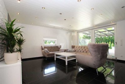 Perfekt für die Familie! Stilvolles Einfamilienhaus mit gemütlicher Terrasse und sonnigem Garten!