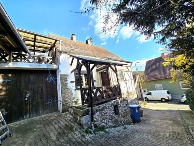 Freistehendes Einfamilienhaus mit Scheunen zu verkaufen