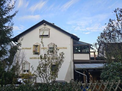 Mehrfamilienhaus im Grünen mit Wintergarten | 251 qm Wohnfläche | 2 Stellplätze | Eppstein-Bremthal