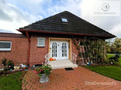 Teilmodernisiertes Einfamilienhaus mit Garten,ruhiger Lage,Garage, vielseitigem Wohnkonzept in Sande