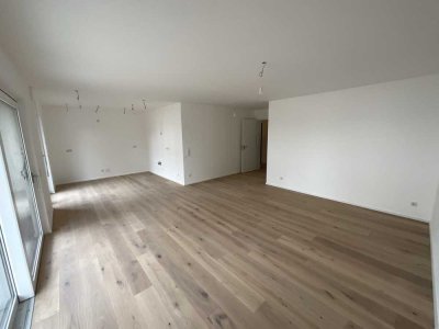 ERSTBEZUG! Exklusive 3-Zimmer-Gartenwohnung mit Einbauküche, Tiefgarage, Gäste-WC, Abstellzimmer