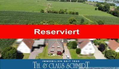 Reserviert: Wohnhaus mit Vollkeller & Garage nur rd. 400 m vom Weserstrand