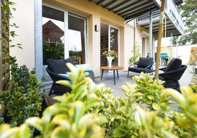 GOLD IMMOBILIEN: Großzügige Erdgeschosswohnung mit gemütlicher Terrasse