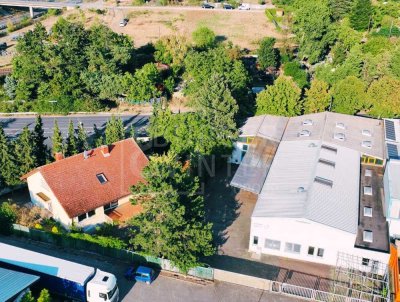 Attraktives Gewerbegrundstück mit Halle & entkerntem Wohnhaus in Schwetzingen