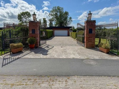 Exklusiver Bungalow auf traumhaftem Grundstück mit großem Potential