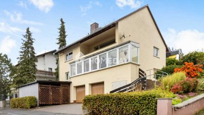 Familienidylle im Grünen – vielseitiges Zweifamilienhaus mit Ausbaureserve