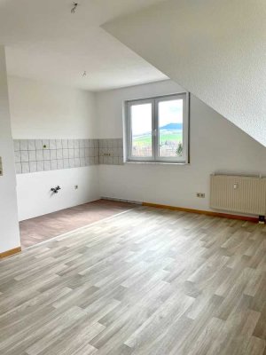 2-Zimmer-DG-Wohnung mit tollem Weitblick in Schönfeld