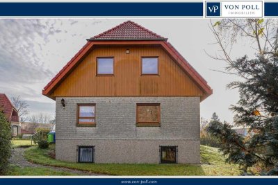 Ein charmantes Einfamilienhaus mit großem Garten und durchdachter Raumaufteilung