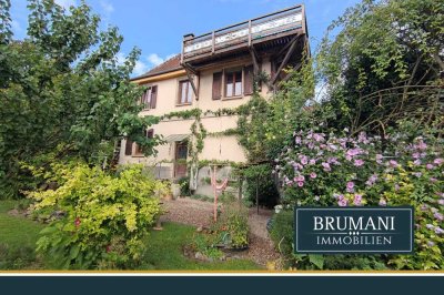 BRUMANI | Charmantes Zweifamilienhaus mit großem Garten direkt an der Grenze zu Deutschland