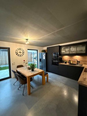 Großzügige 4-Zimmer Wohnung mit Garten in Unterhaching