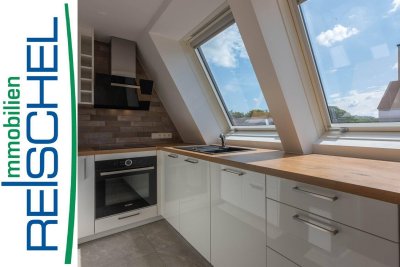 Direkt an der Grenze Schwechat - Moderne Maisonettewohnung mit Eigengarten