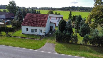Einfamilienhaus mit Scheune auf großem Grundstück