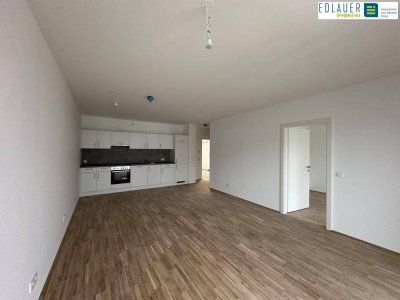 2-Zimmer-Neubauwohnung mit Balkon - Stadthaus zum Fluss!